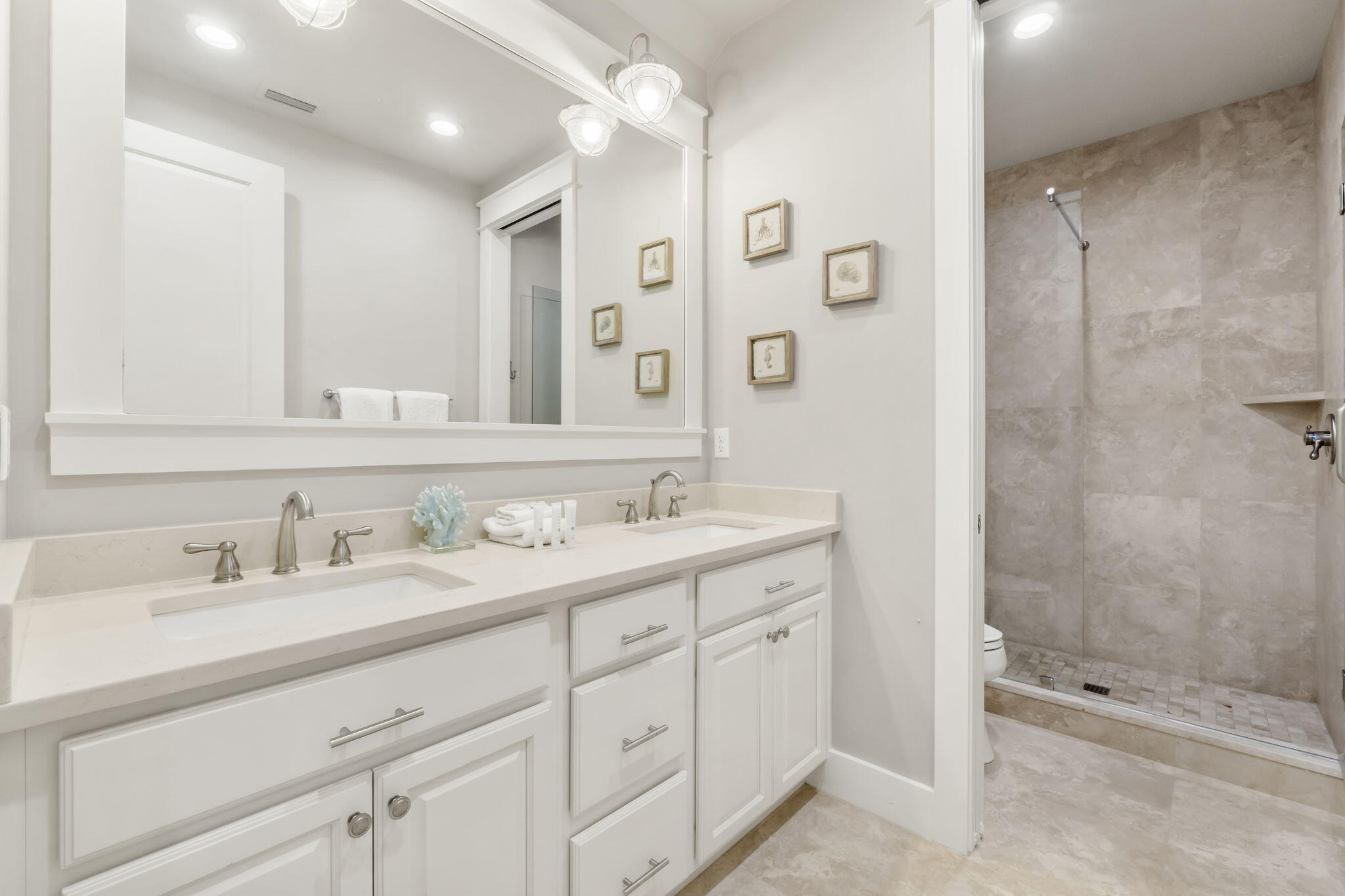27 Anchor Rode Circle Santa Rosa Beach, FL 32459 - Photo 26 of 44 a bathroom with a double vanity sink mirror double and shower