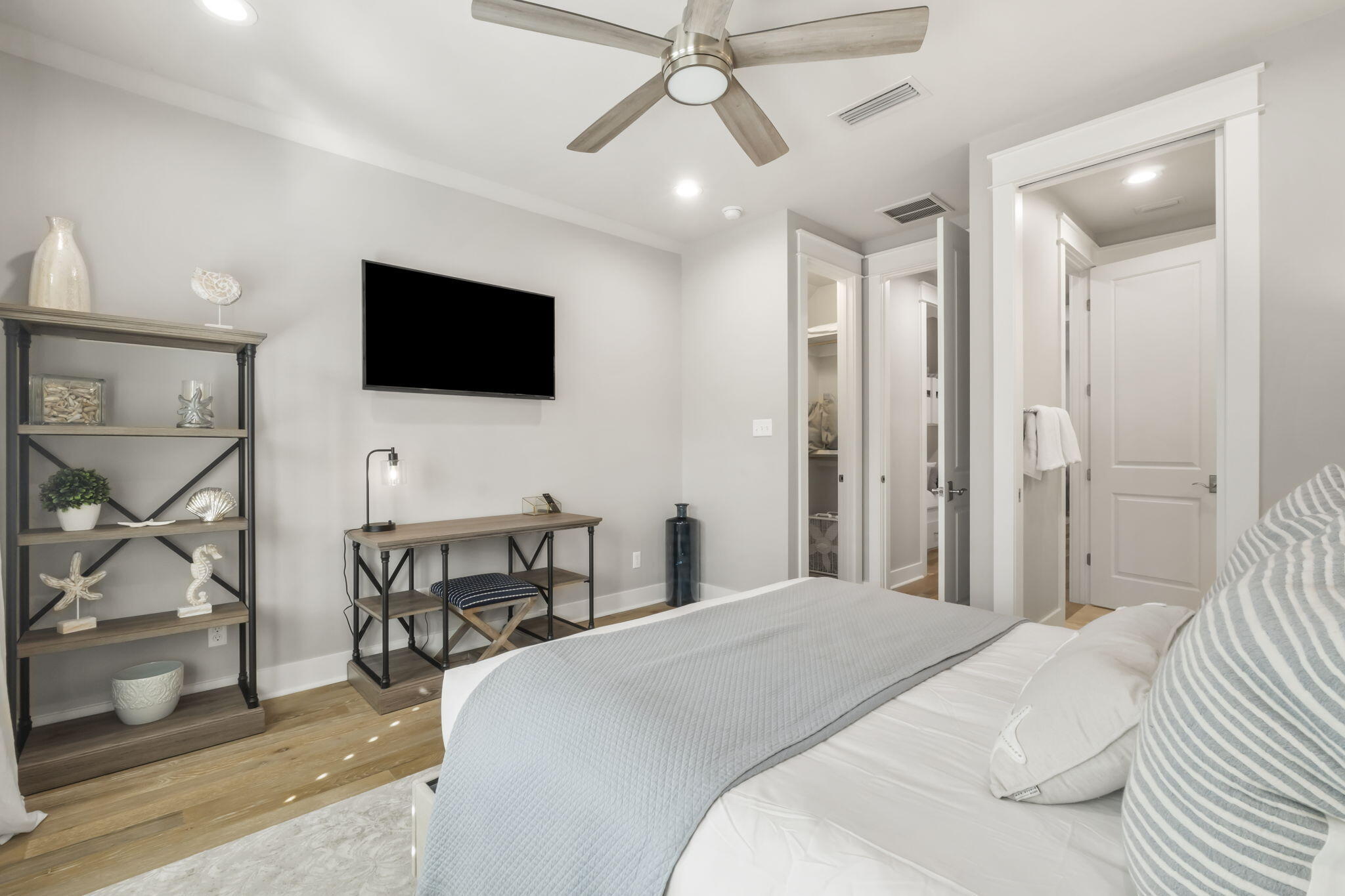 27 Anchor Rode Circle Santa Rosa Beach, FL 32459 - Photo 28 of 44 a bedroom with a bed and a flat screen tv