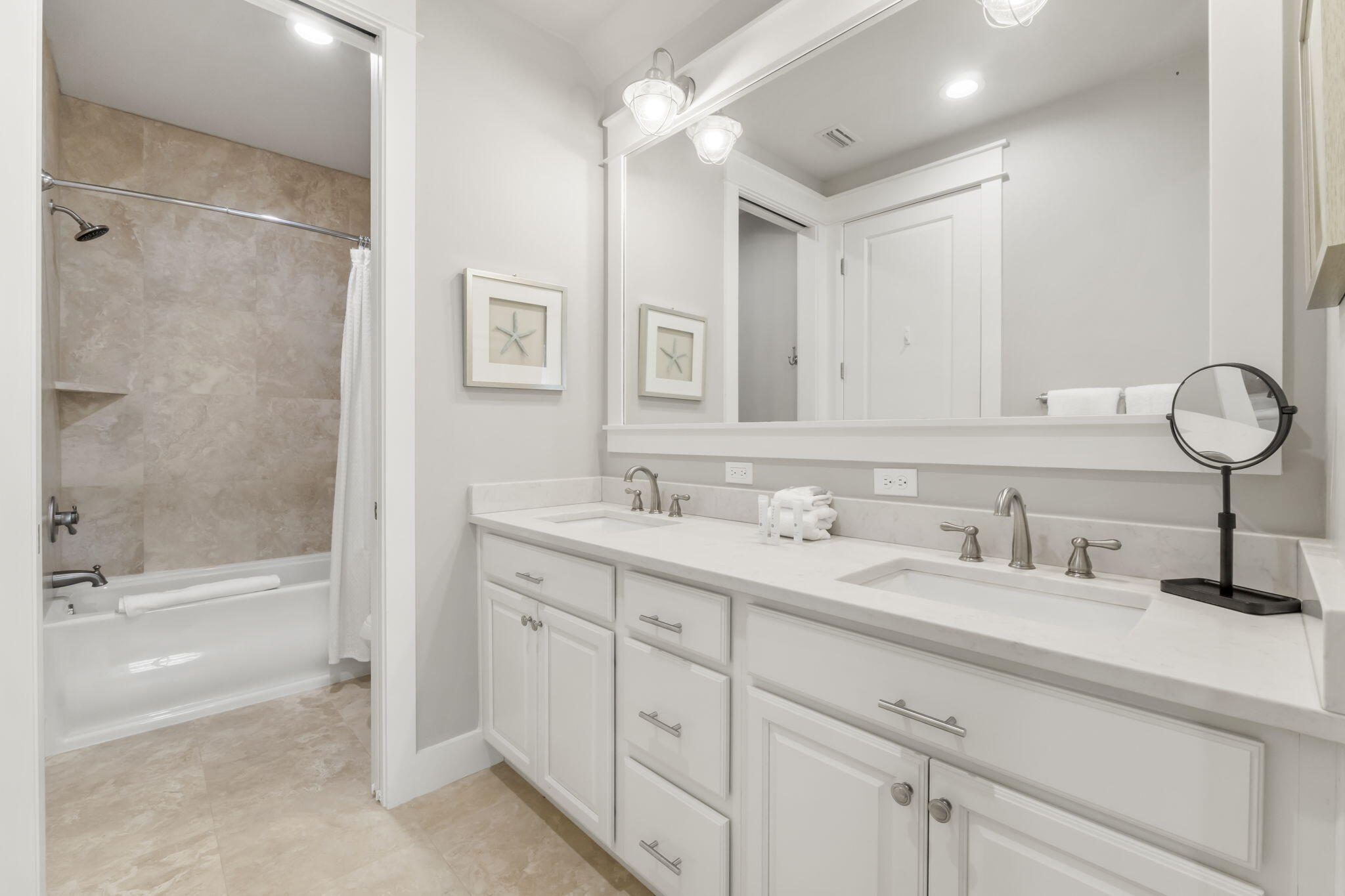 27 Anchor Rode Circle Santa Rosa Beach, FL 32459 - Photo 29 of 44 a bathroom with double vanity sink a mirror and a bathtub