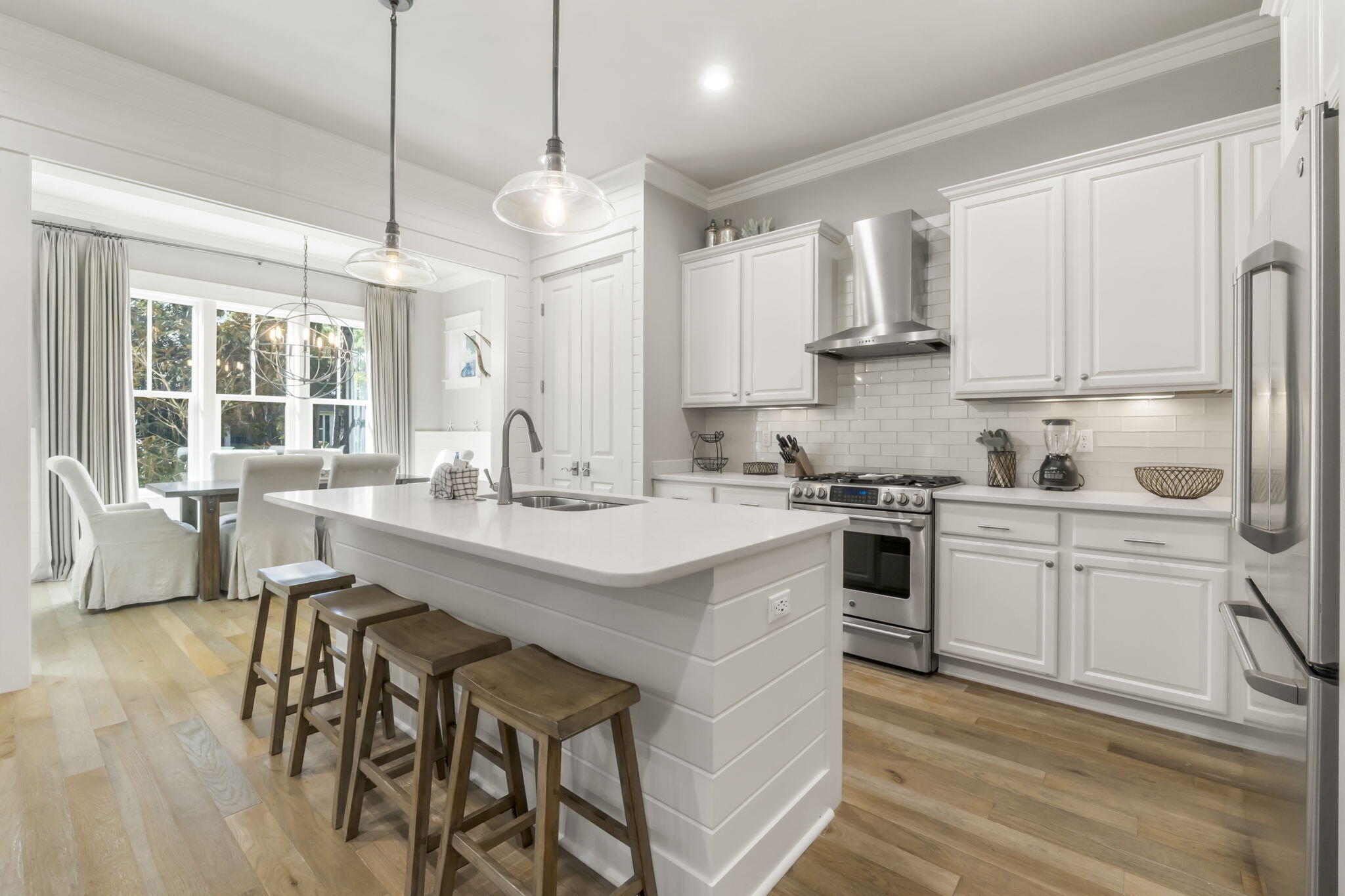 27 Anchor Rode Circle Santa Rosa Beach, FL 32459 - Photo 5 of 44 a kitchen with stainless steel appliances granite countertop a white cabinets and a stove top oven