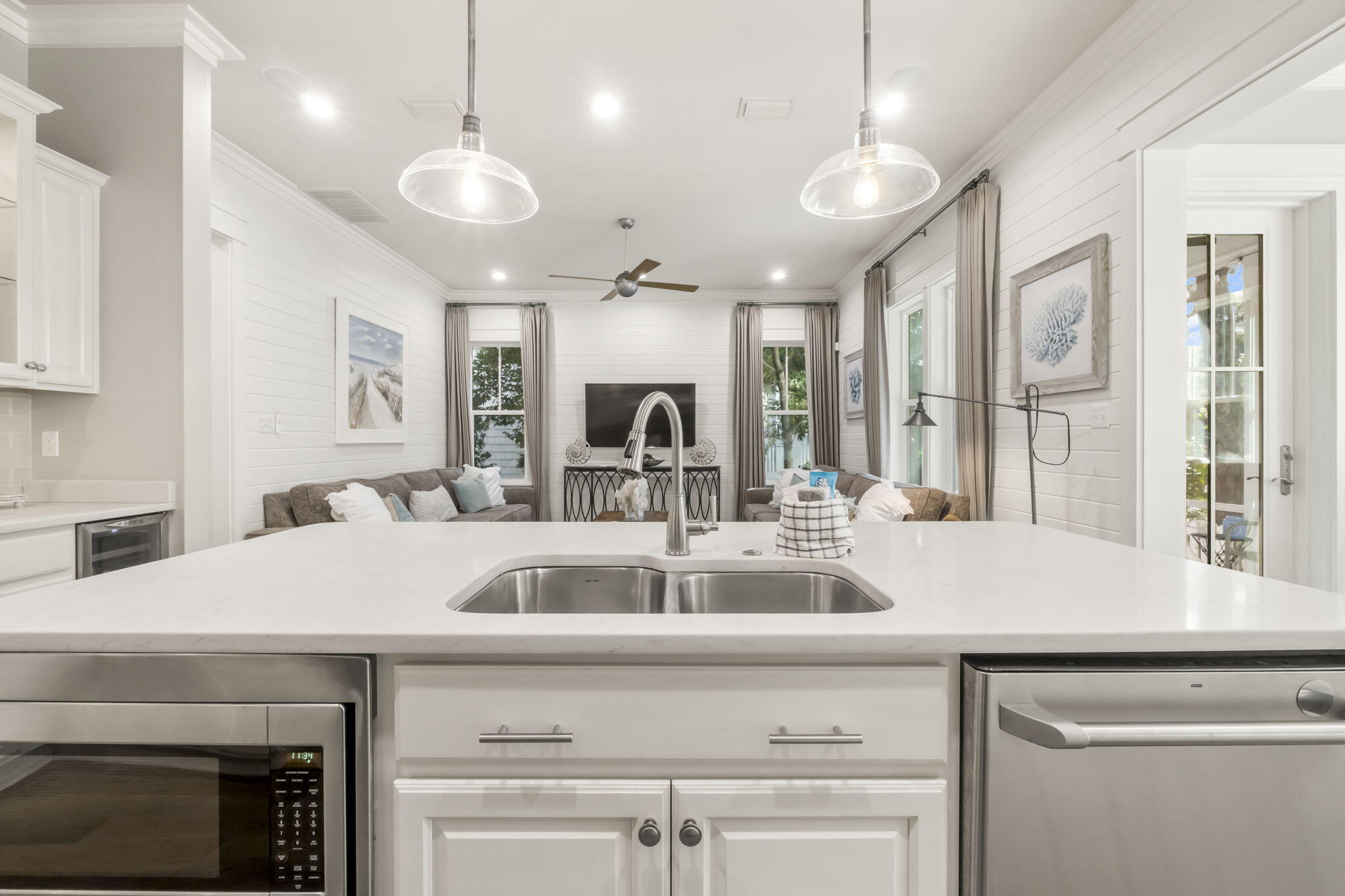 27 Anchor Rode Circle Santa Rosa Beach, FL 32459 - Photo 6 of 44 a kitchen with a sink a counter space and a refrigerator