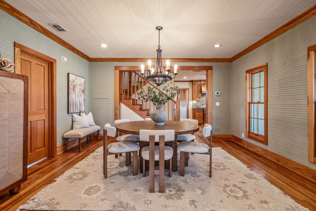 9402 Doss-Spring Creek Road Doss, TX 78618 - Photo 13 of 78 a view of a dining room with furniture window and wooden floor