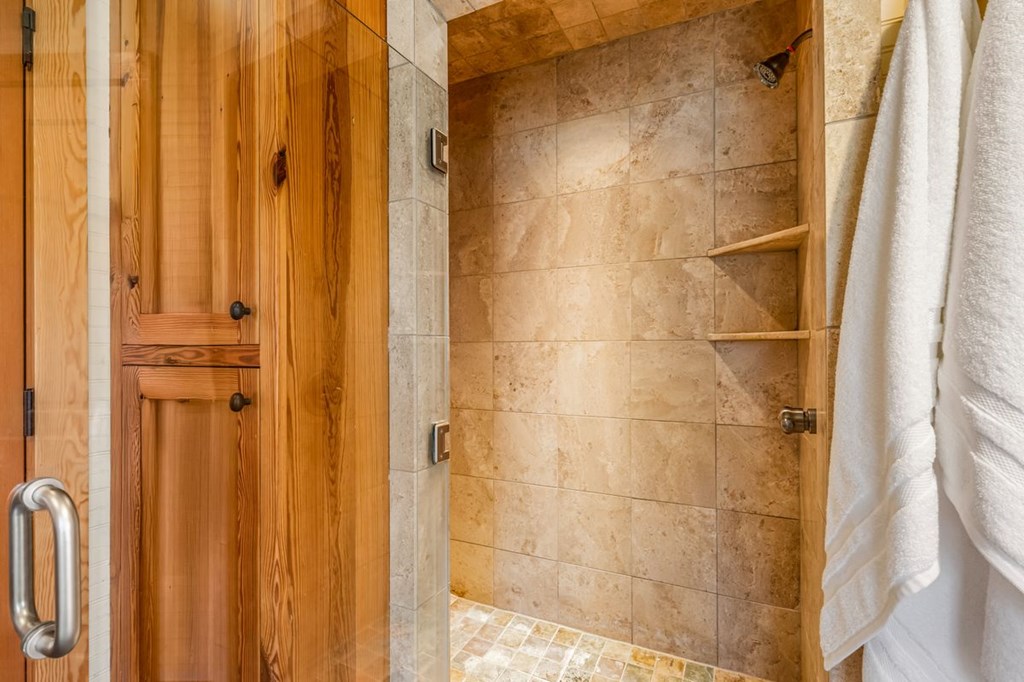9402 Doss-Spring Creek Road Doss, TX 78618 - Photo 24 of 78 a bathroom with a shower