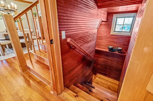 a bathroom with a granite countertop sink a mirror and a vanity