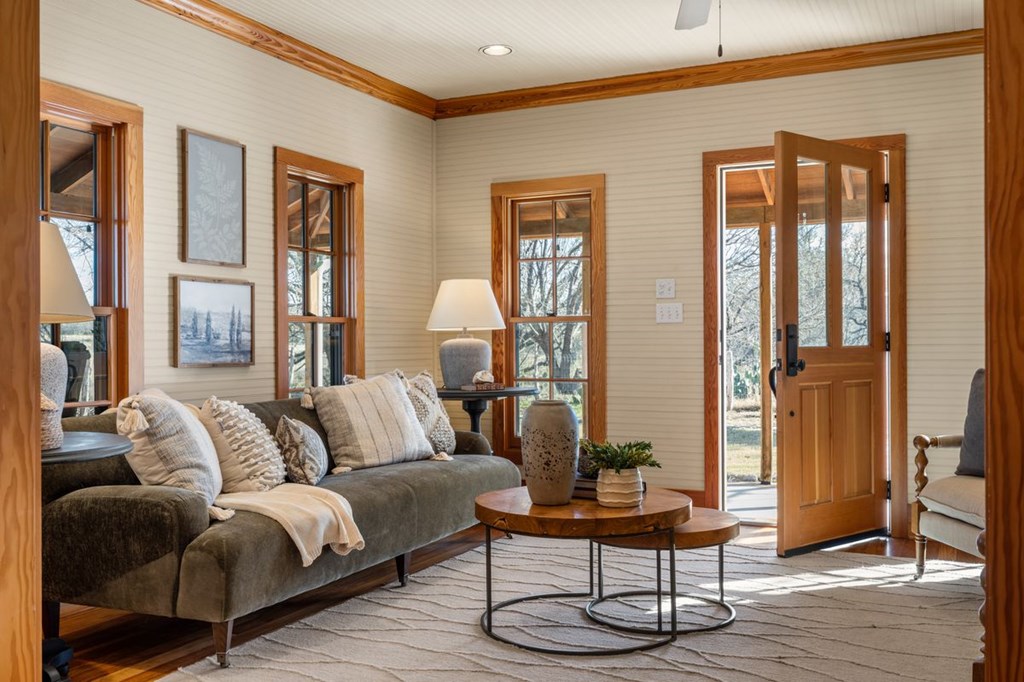 9402 Doss-Spring Creek Road Doss, TX 78618 - Photo 10 of 78 a living room with furniture and wooden floor