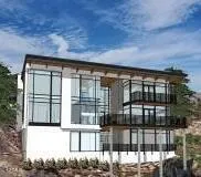 a front view of a house with a glass windows