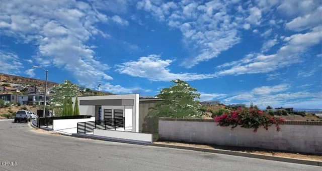 front view of a house with a street