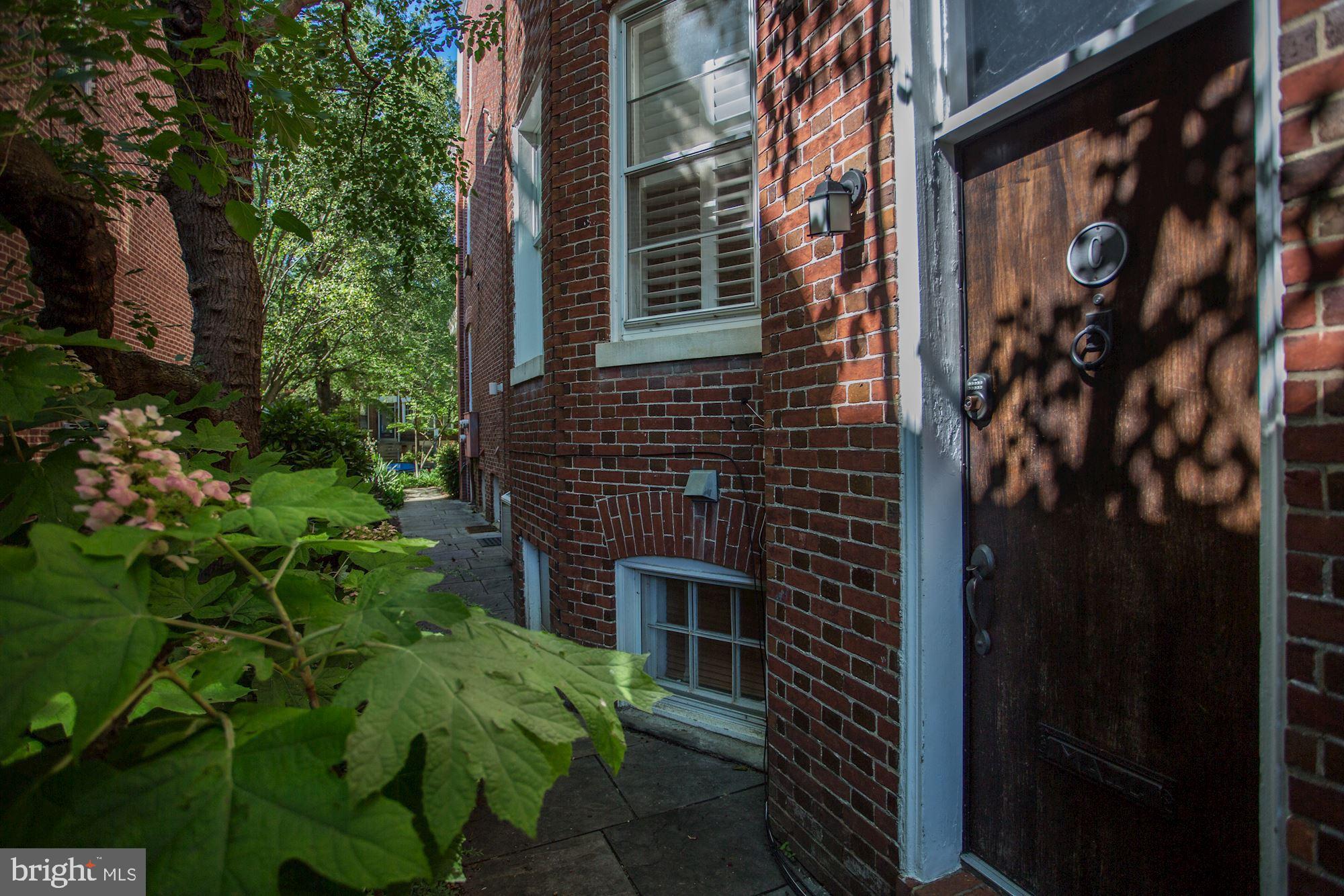1752 Park Road Northwest, Unit A Washington, DC 20010 - Photo 49 of 55 Amazing lush greenery around the side of the home