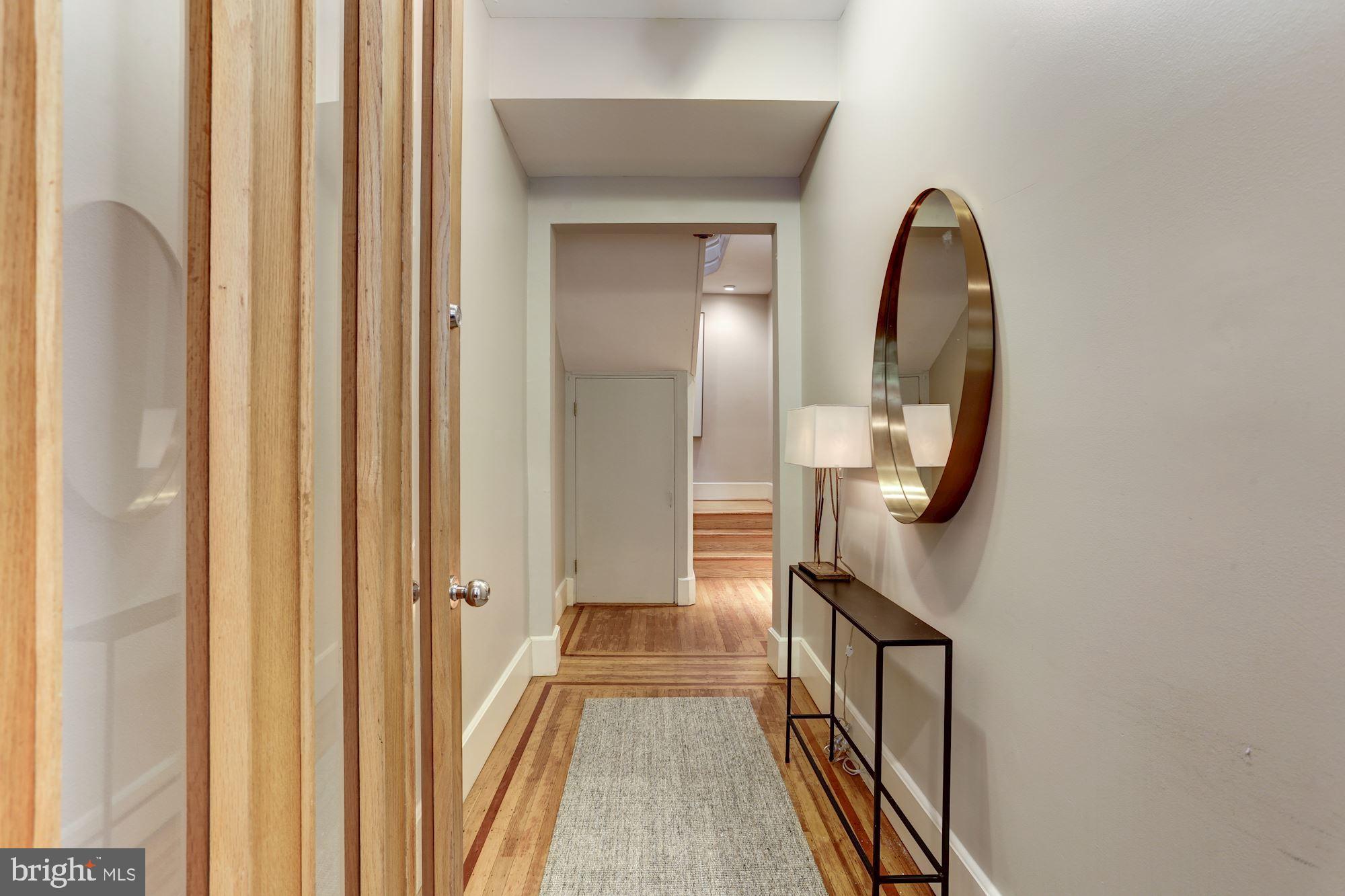 1752 Park Road Northwest, Unit A Washington, DC 20010 - Photo 9 of 55 Original hdwd floors in the lower level entryway!