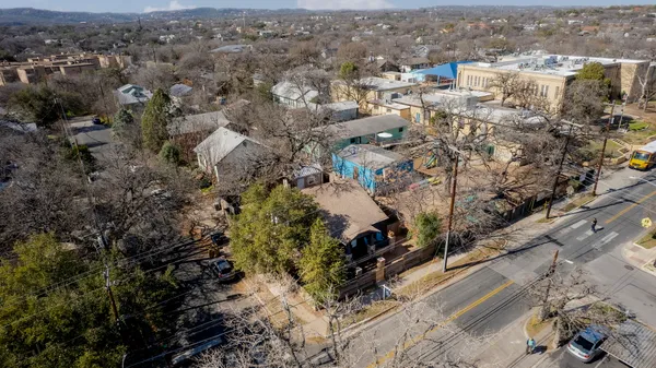 an aerial view of a city with lots of residential buildings