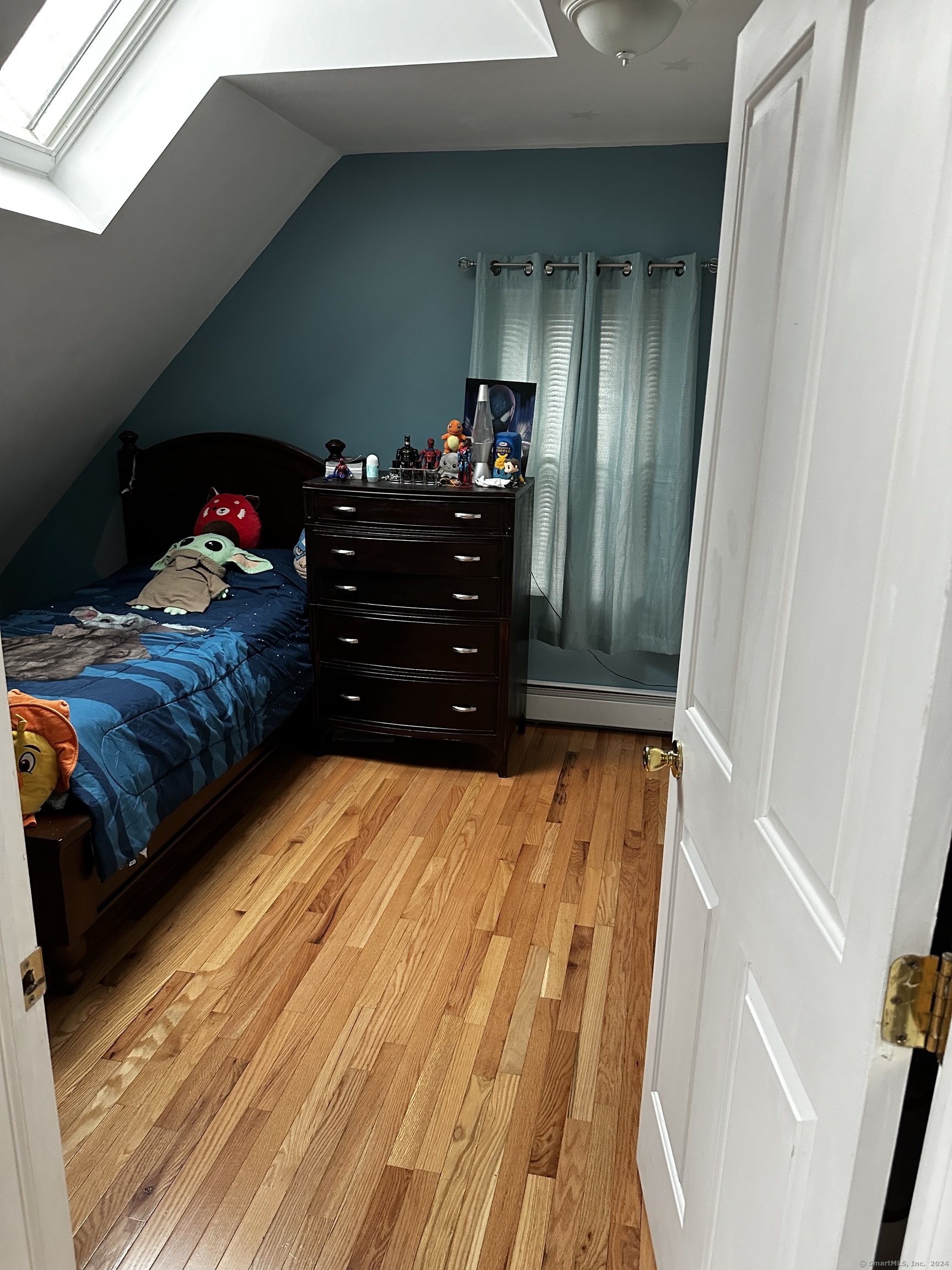 504 Dixwell Avenue New Haven, CT 06511 - Photo 14 of 26 a bed room with a bed