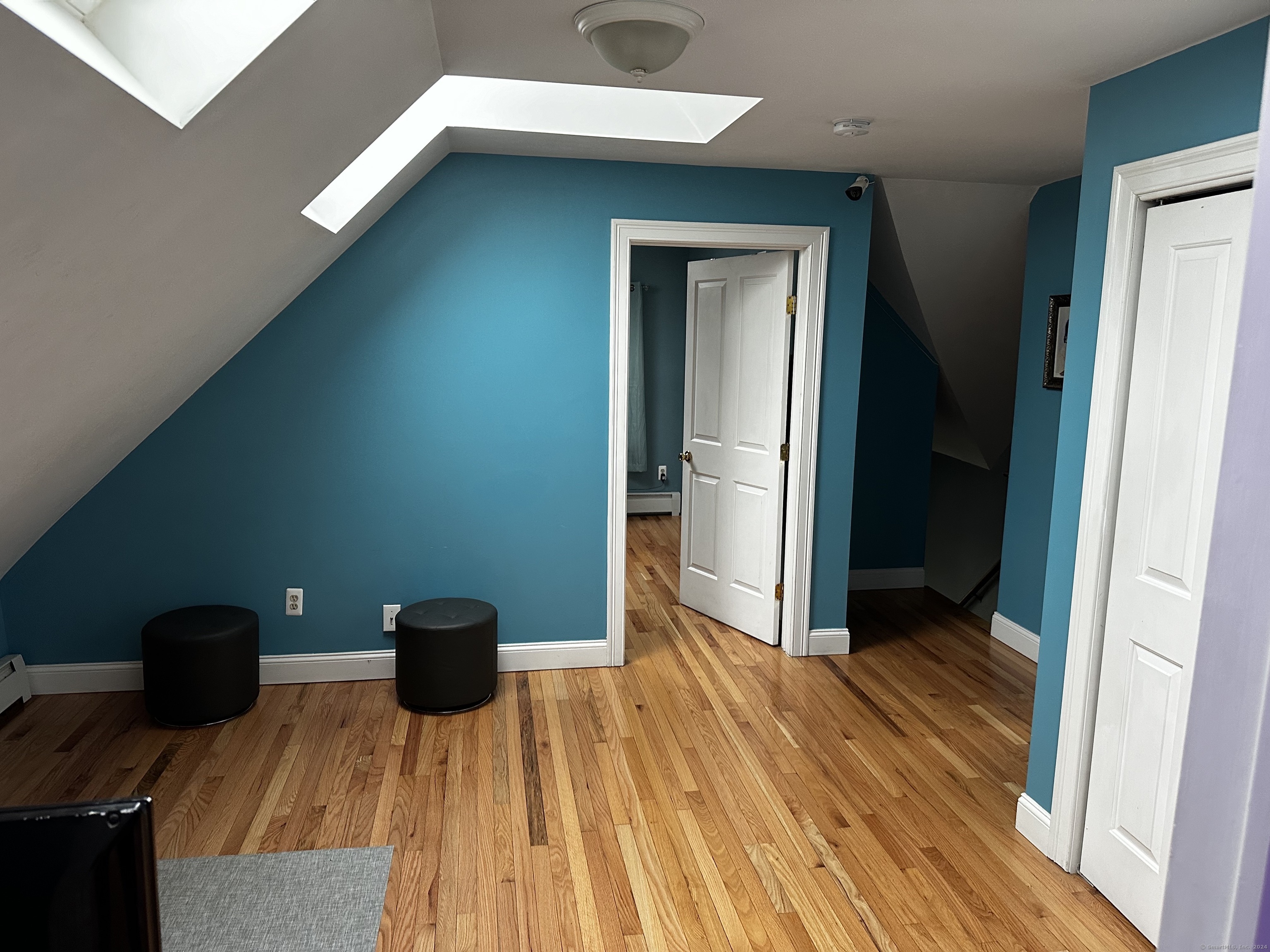 504 Dixwell Avenue New Haven, CT 06511 - Photo 21 of 26 a view of a hallway with wooden floor and staircase