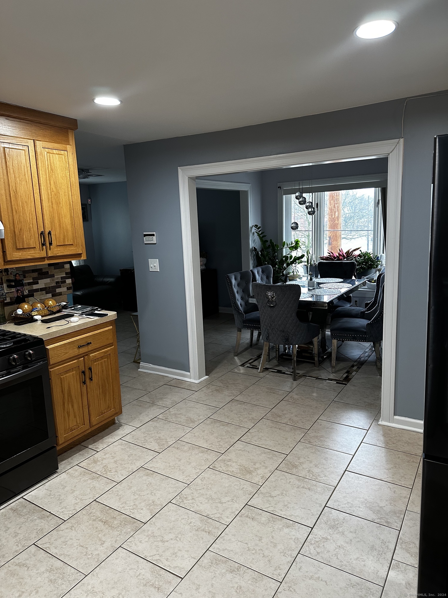 504 Dixwell Avenue New Haven, CT 06511 - Photo 3 of 26 a view of a kitchen with furniture and window