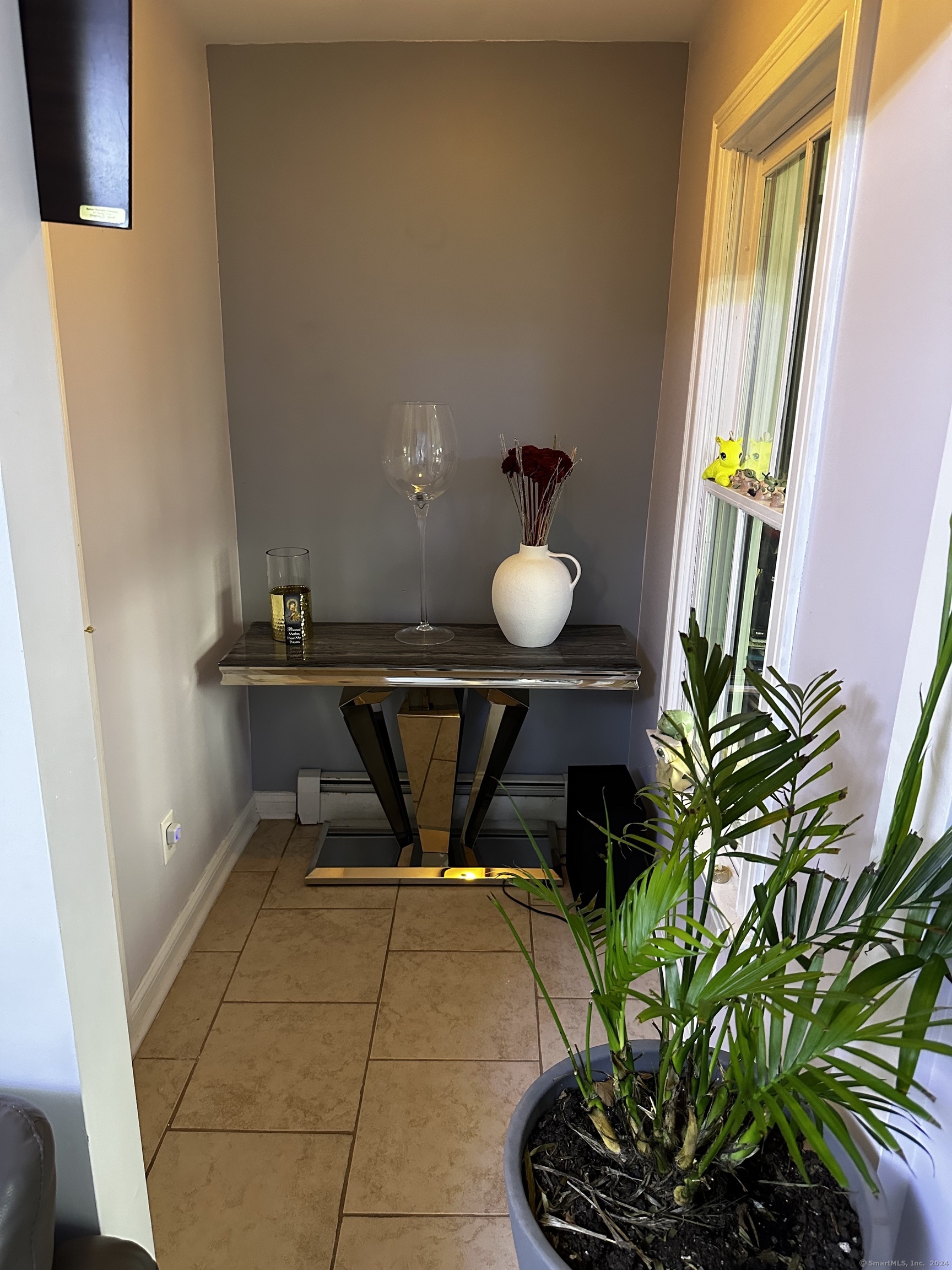 504 Dixwell Avenue New Haven, CT 06511 - Photo 9 of 26 a living room with a rug