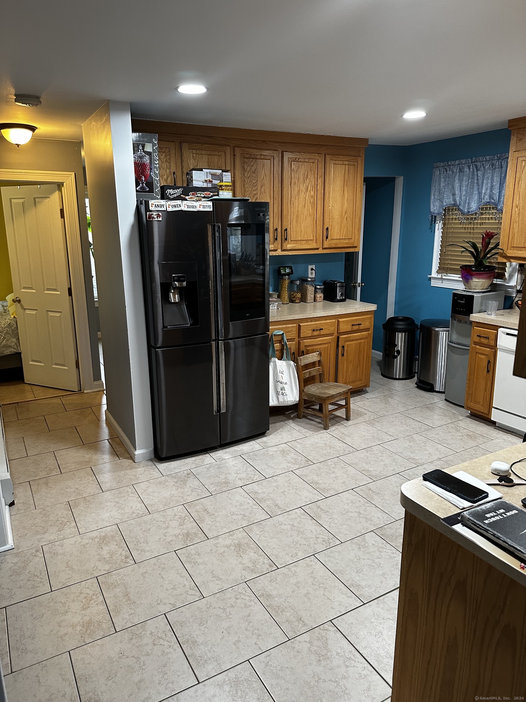 504 Dixwell Avenue New Haven, CT 06511 - Photo 10 of 26 a kitchen with stainless steel appliances granite countertop a refrigerator and a stove