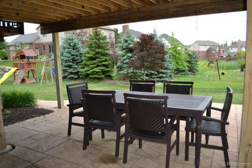 3681 Inverness Drive Rochester, MI 48306 - Photo 27 of 31 Stamped Concrete Patio from Walkout Basement