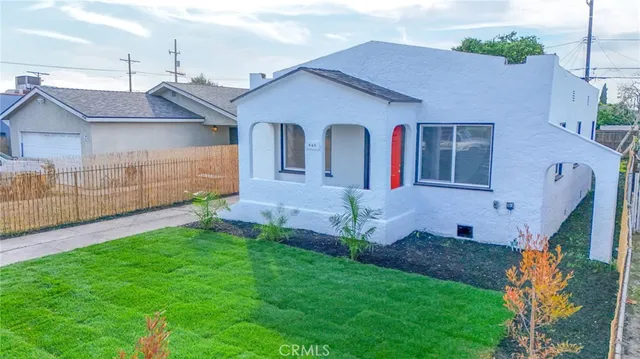 a front view of house with yard