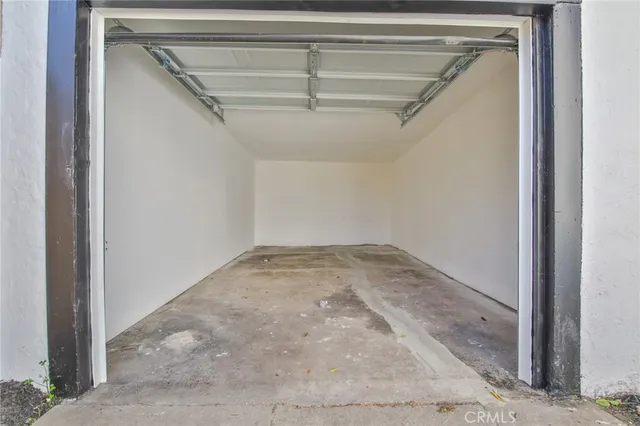 a view of a backyard with a tree