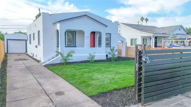 a front view of house with yard
