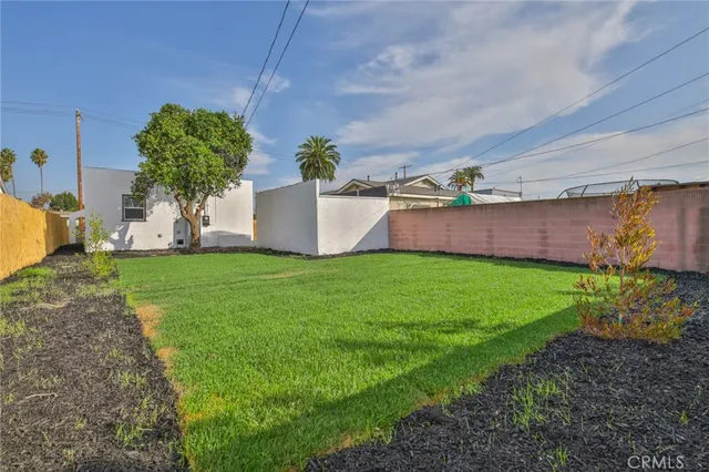 a view of a backyard with a garden