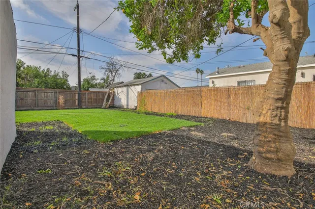 a view of a pathway of a house with wooden floor