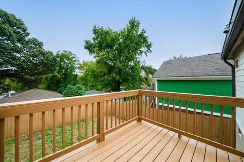 a view of a wooden roof deck