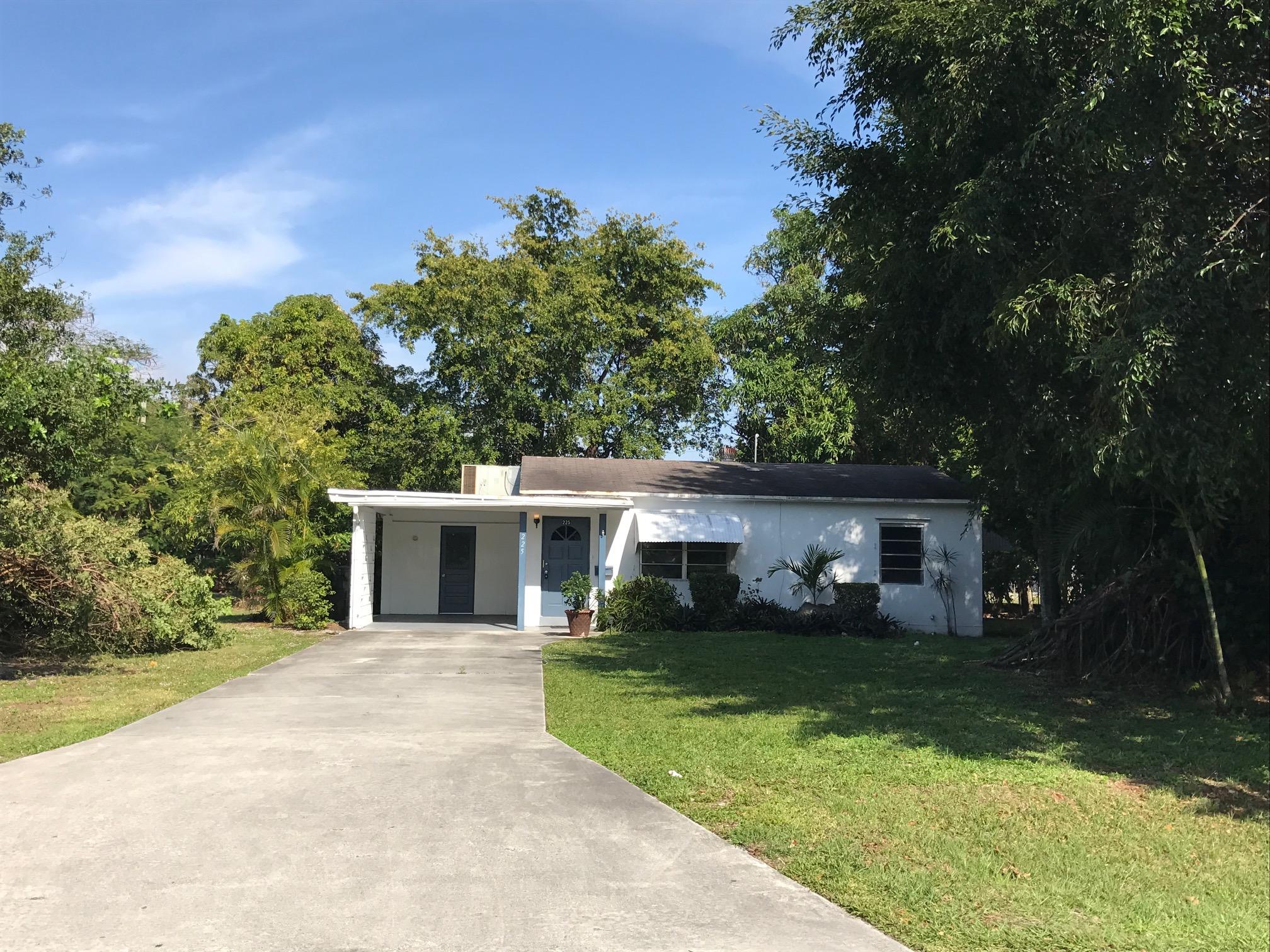 225 Northwest 4th Diagonal Boca Raton, FL 33432 - Photo 1 of 12 front