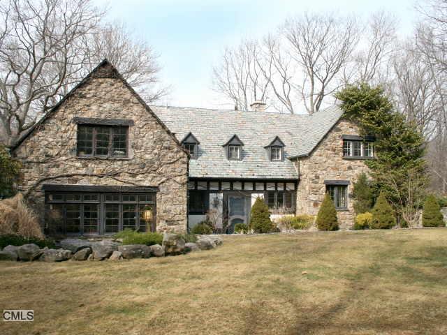 109 Mayapple Road Stamford, CT 06903 - Photo 1 of 1 a front view of a house with a yard and garage