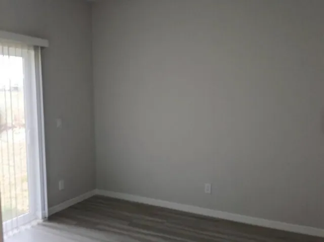 a empty room with a window