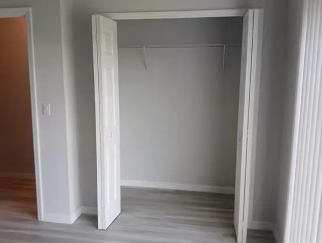 a view of front door with wooden floor