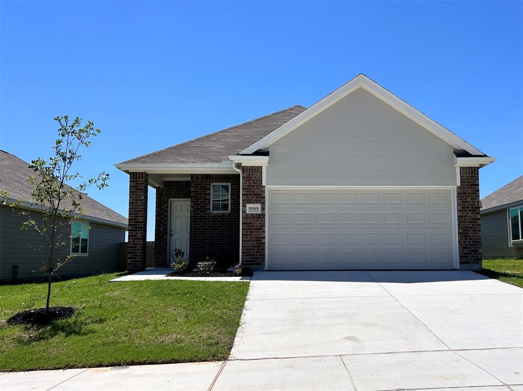9909 Dynamic Drive Fort Worth, TX 76131 - Photo 1 of 1 a view of a house with a small yard and a large window