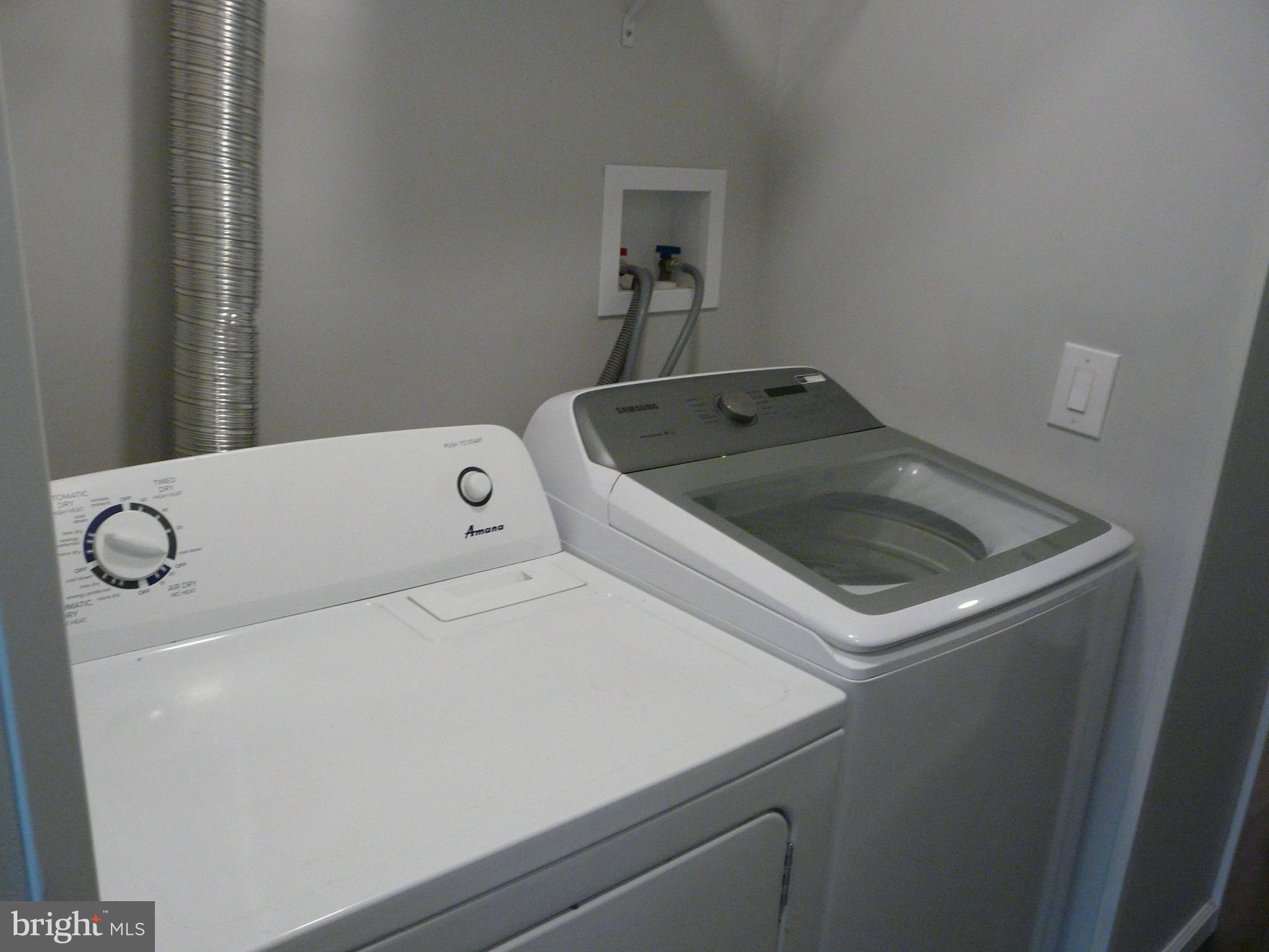 1009 Fuselage Avenue Middle River, MD 21220 - Photo 14 of 28 a utility room with dryer and washer
