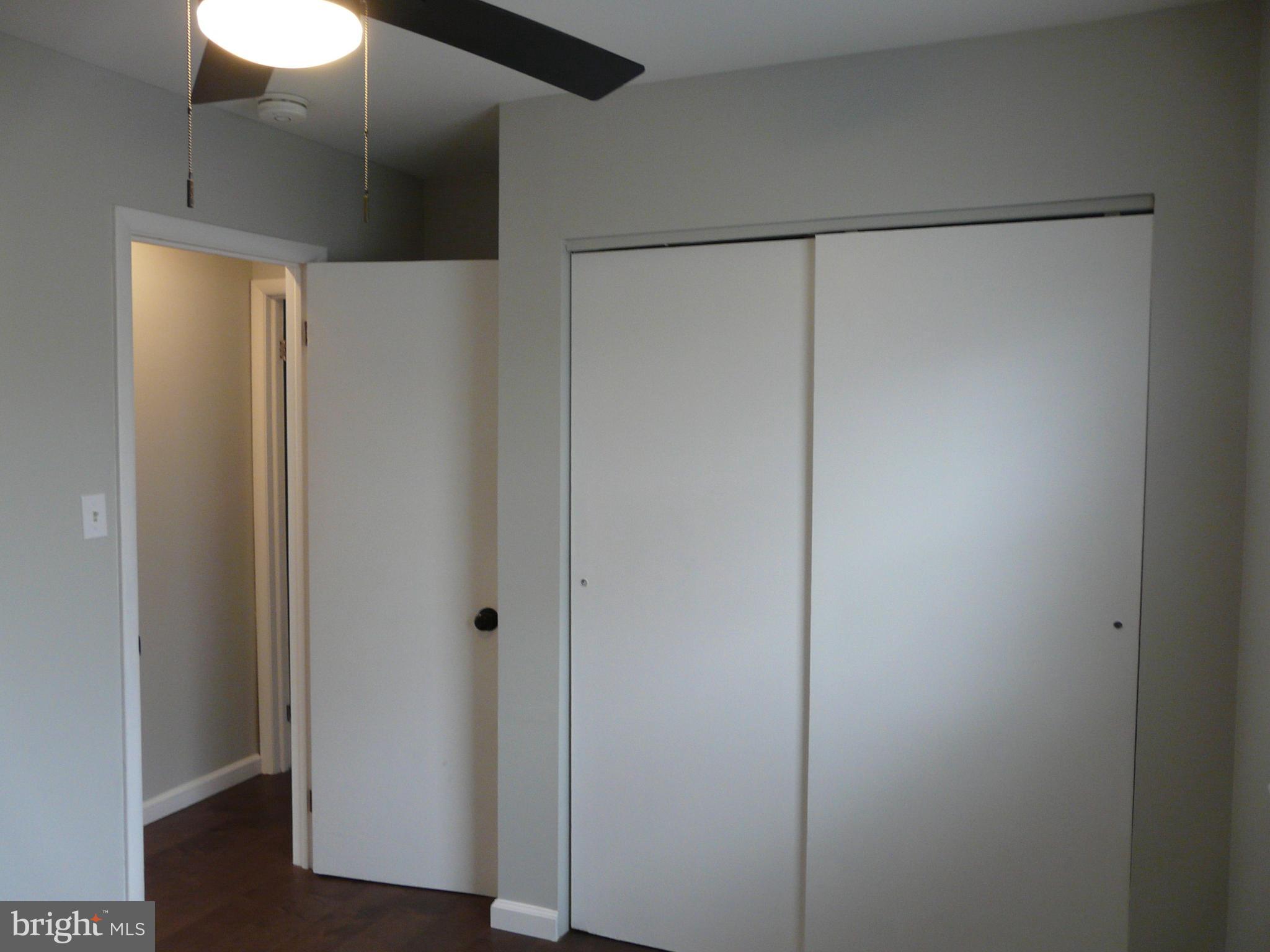 1009 Fuselage Avenue Middle River, MD 21220 - Photo 16 of 28 a bathroom with a glass shower door