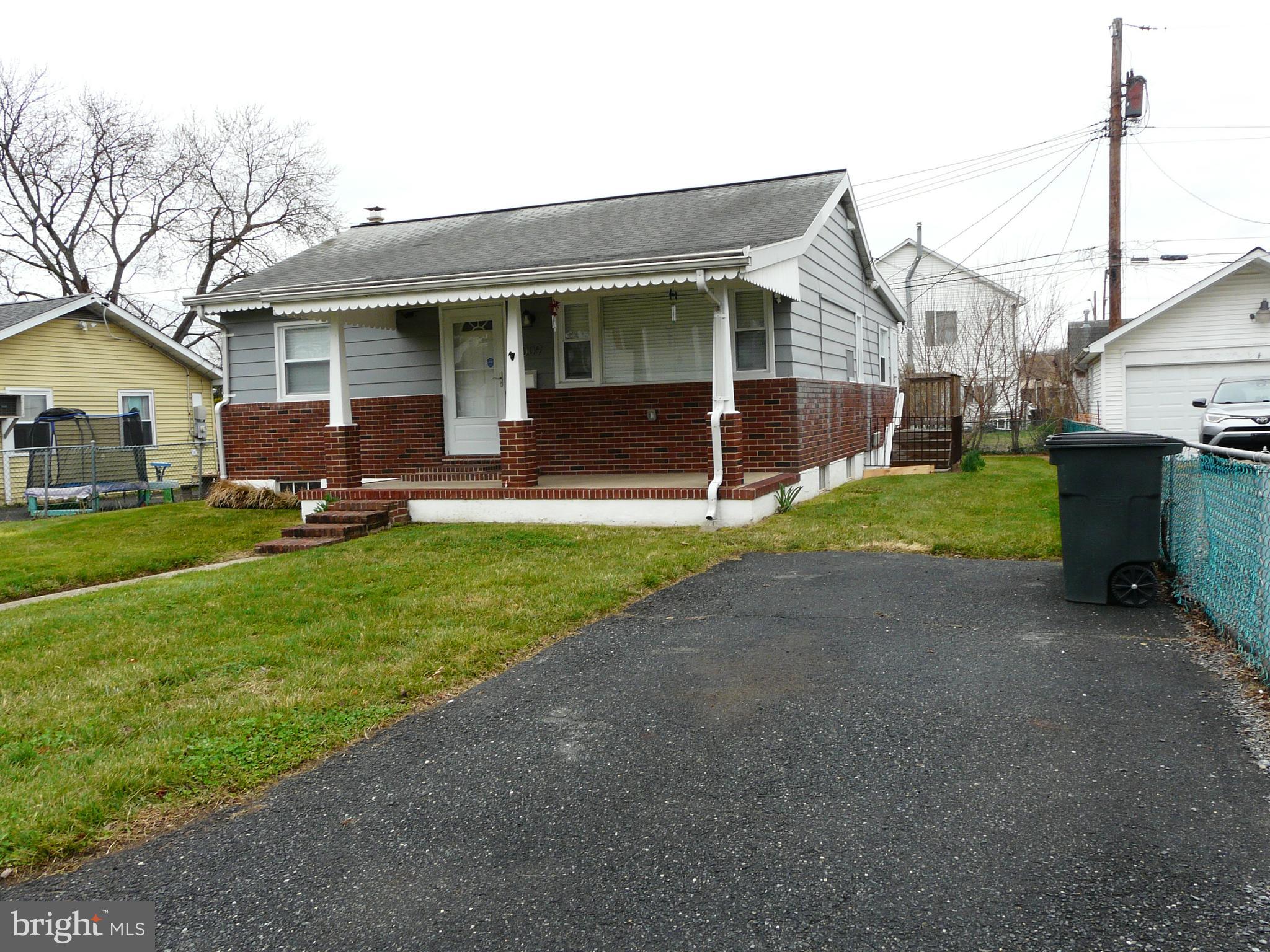 1009 Fuselage Avenue Middle River, MD 21220 - Photo 2 of 28 a view of a house with a yard and sitting area