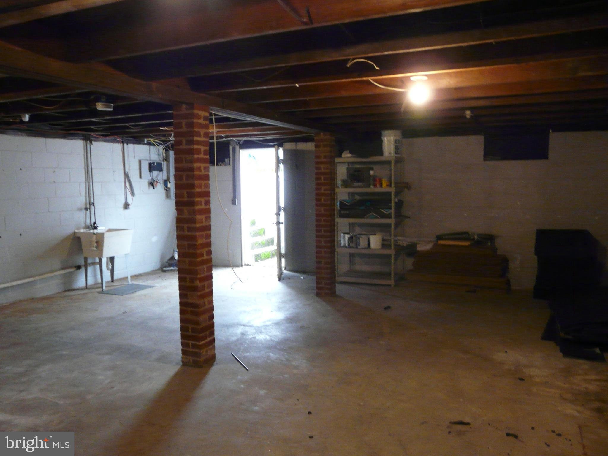 1009 Fuselage Avenue Middle River, MD 21220 - Photo 25 of 28 a view of empty room with wooden floor and windows