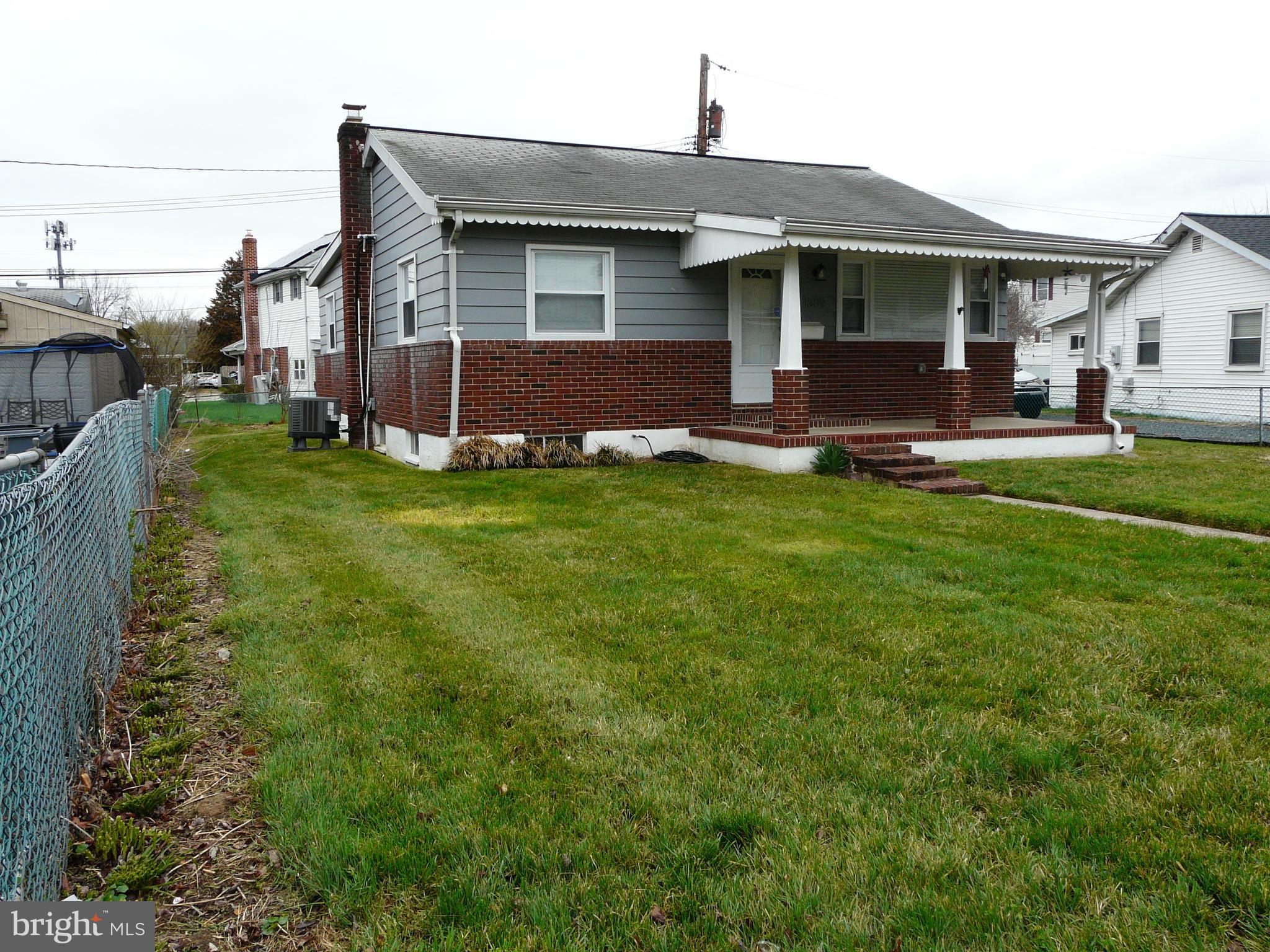 1009 Fuselage Avenue Middle River, MD 21220 - Photo 3 of 28 a view of an house with backyard space and balcony