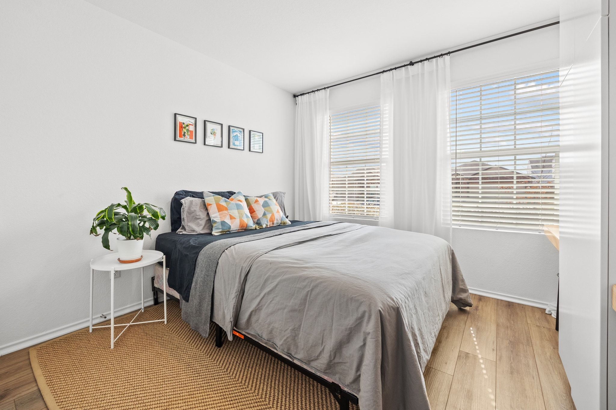 124 Perfect World Loop Jarrell, TX 76537 - Photo 13 of 32 a bedroom with a bed and a window