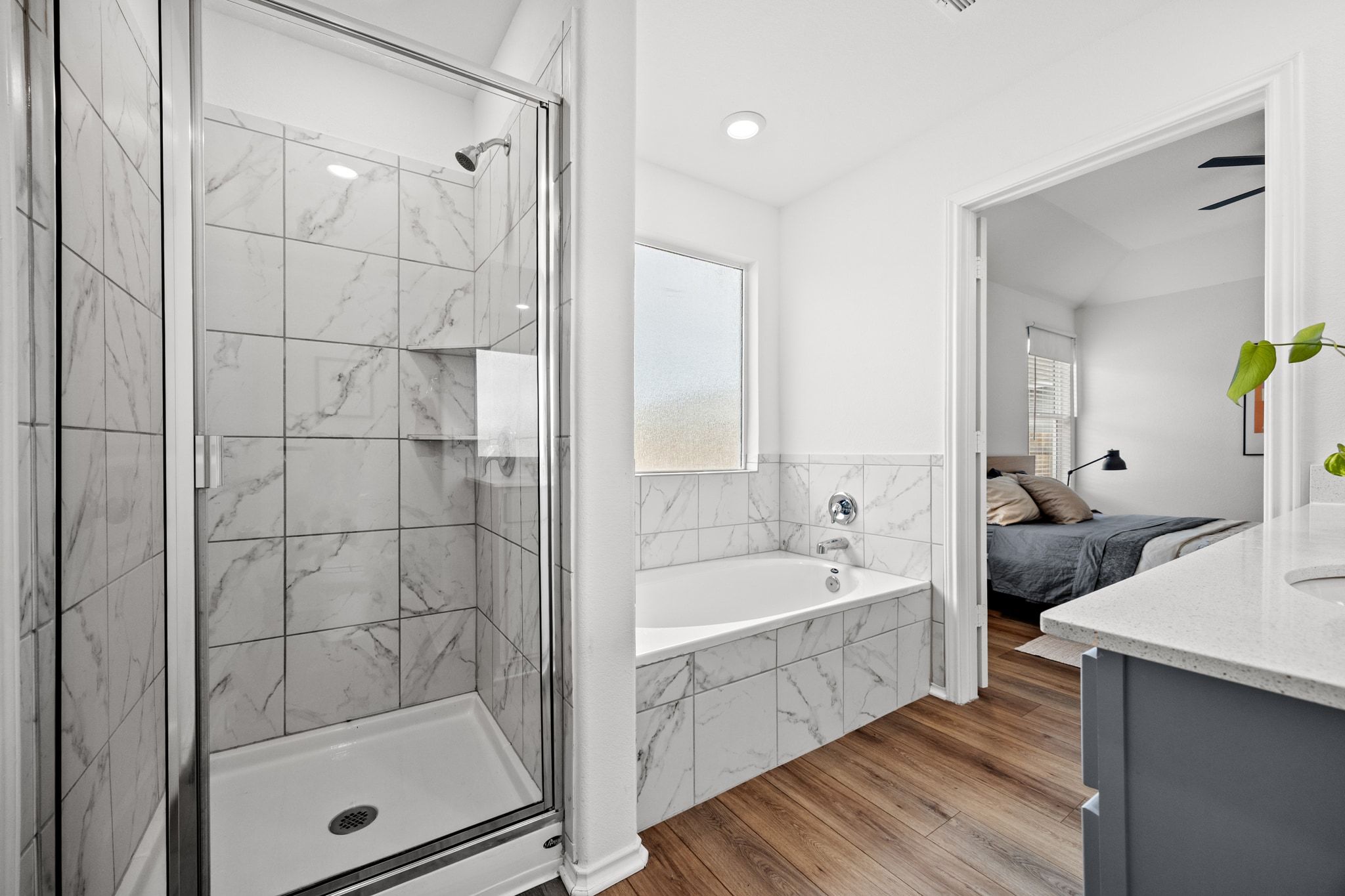 124 Perfect World Loop Jarrell, TX 76537 - Photo 19 of 32 a spacious bathroom with a bathtub and a shower