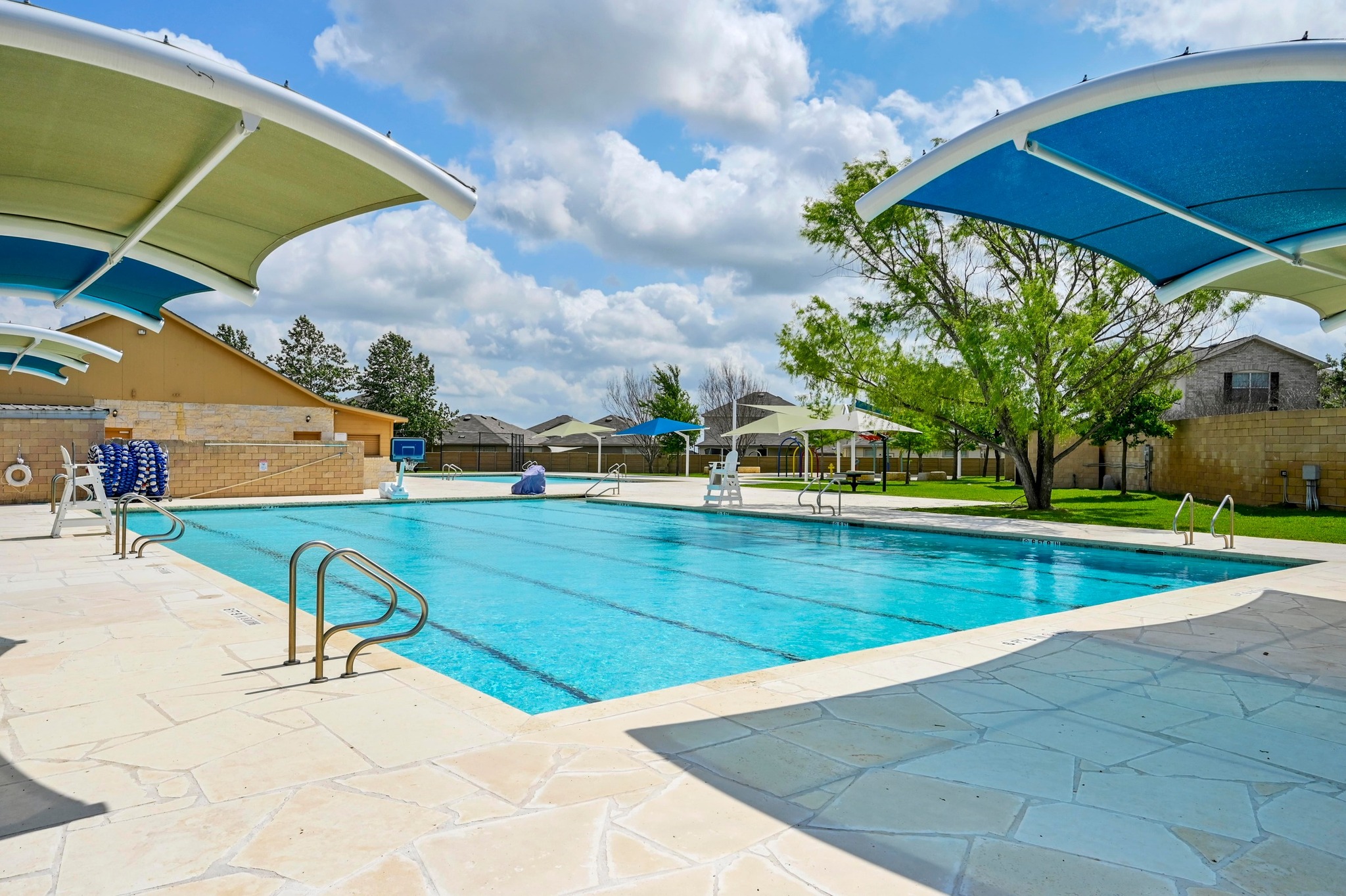 124 Perfect World Loop Jarrell, TX 76537 - Photo 26 of 32 a view of yard with swimming pool outdoor seating
