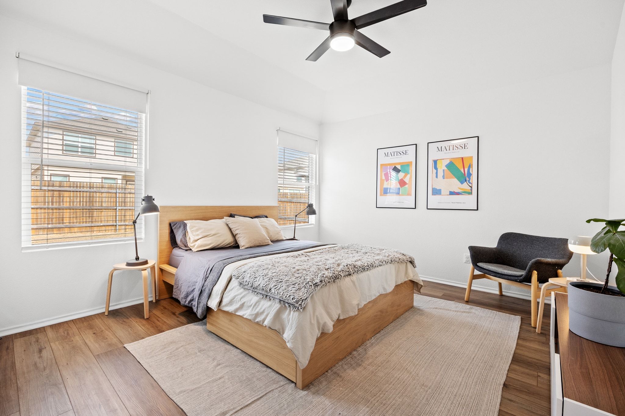 124 Perfect World Loop Jarrell, TX 76537 - Photo 4 of 32 a bedroom with a bed and wooden floor