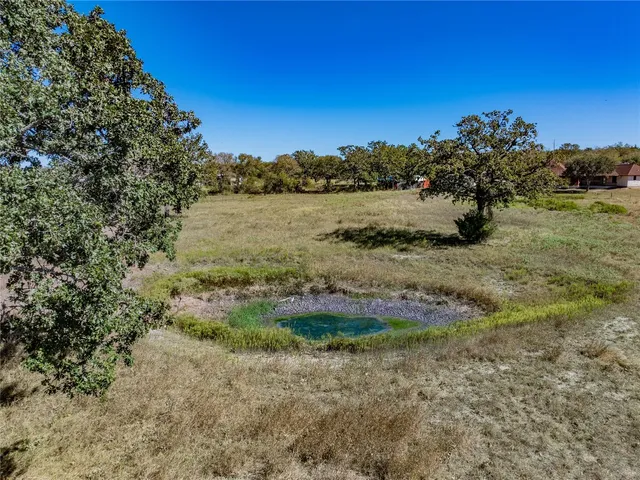 a view of a lake with mountains in the background