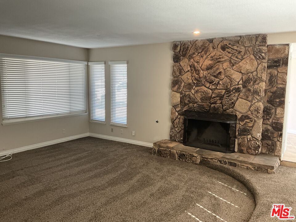 19125 Ottawa Road Apple Valley, CA 92308 - Photo 3 of 15 an empty room with windows