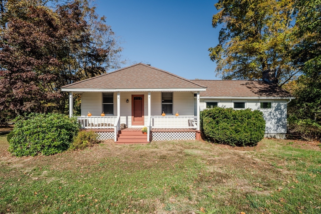 a front view of a house with porch