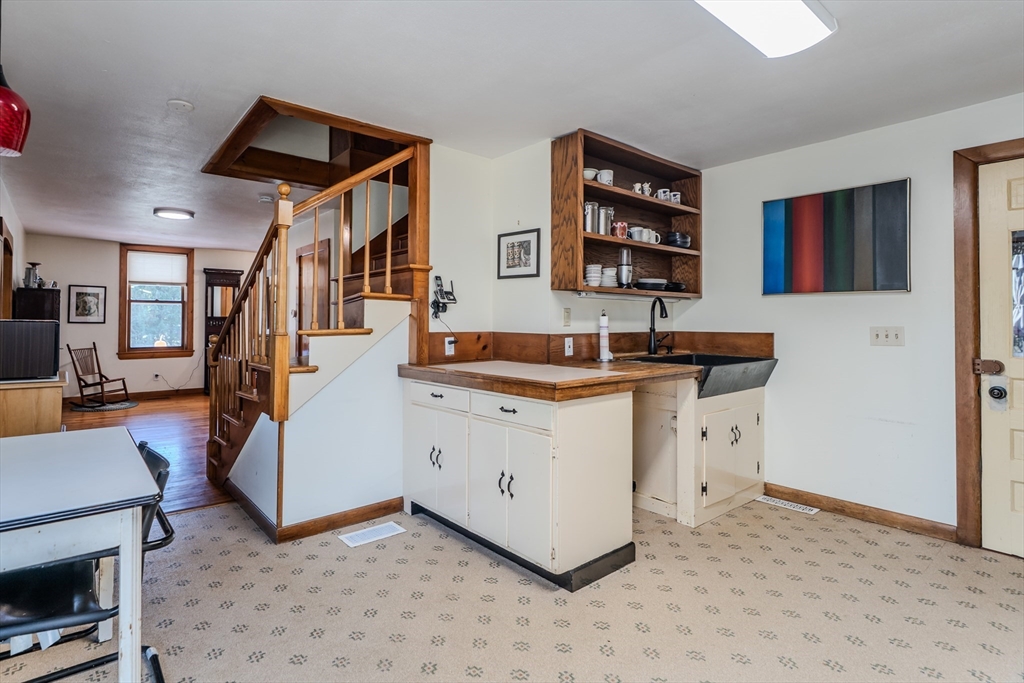 200 Long Plain Road Leverett, MA 01054 - Photo 13 of 40 a kitchen view with cabinets and window