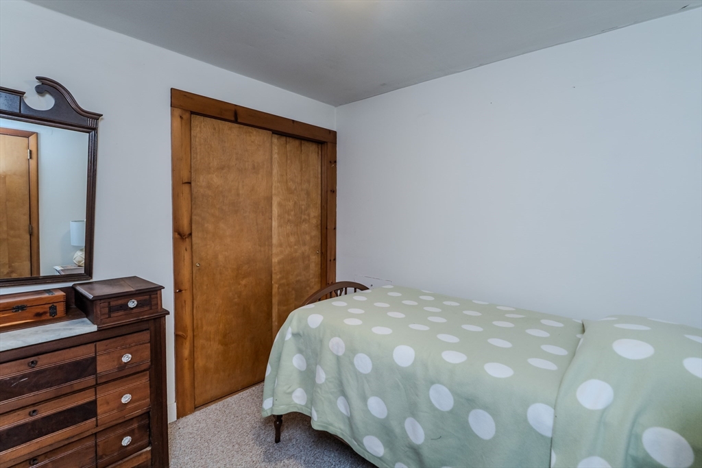 200 Long Plain Road Leverett, MA 01054 - Photo 18 of 40 a bedroom with a bed and a dresser