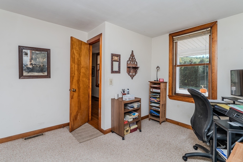 200 Long Plain Road Leverett, MA 01054 - Photo 21 of 40 a view of a livingroom with workspace and a window