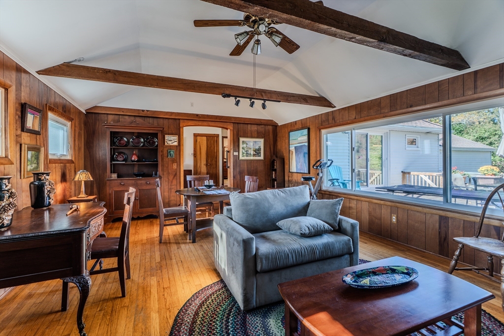 200 Long Plain Road Leverett, MA 01054 - Photo 6 of 40 a living room with furniture a chandelier and a dining table