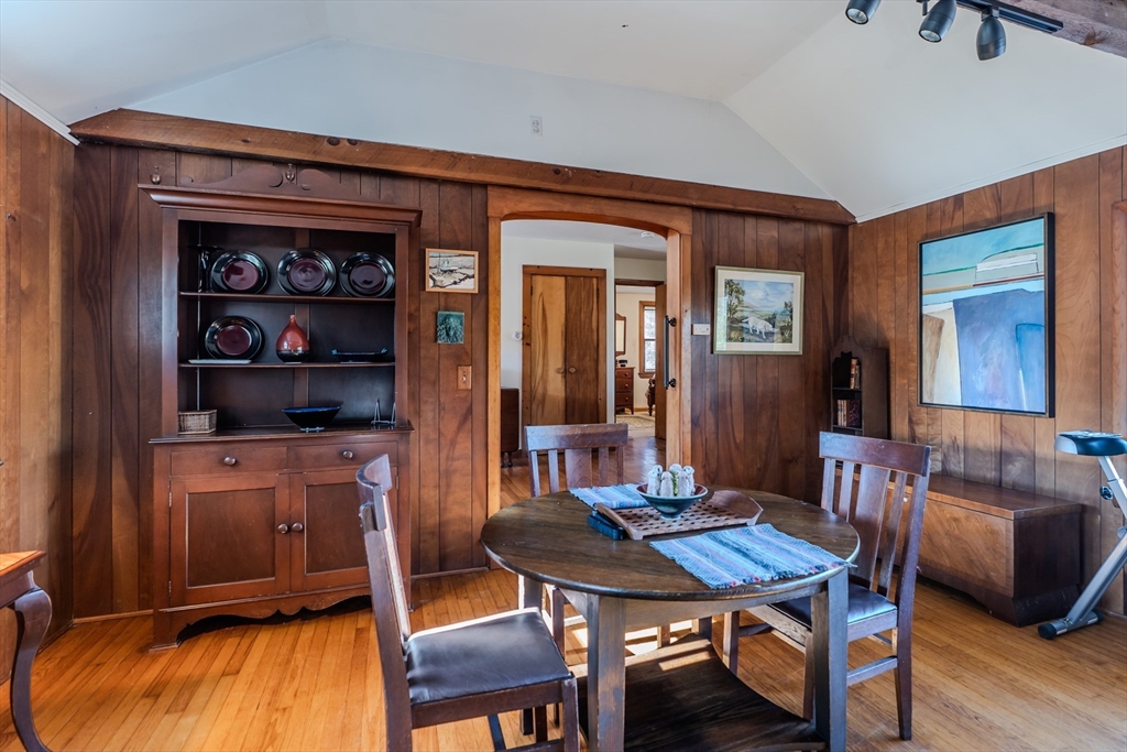 200 Long Plain Road Leverett, MA 01054 - Photo 7 of 40 a view of a dining room with furniture and wooden floor