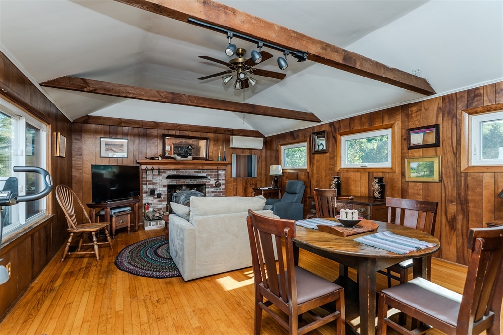 200 Long Plain Road Leverett, MA 01054 - Photo 8 of 40 a view of a dining room with furniture window and wooden floor