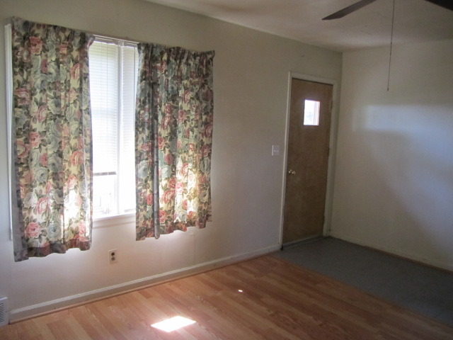 1443 North 32nd Road Ottawa, IL 61350 - Photo 2 of 11 an empty room with windows